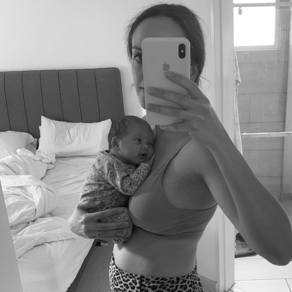 mother-holding-baby-on-chest